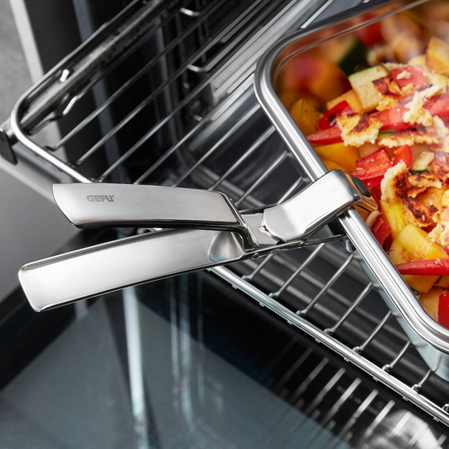 Cepeškrāsns pannas standziņas - rokturis GEFU FIXIT kastroļiem, kūku un picas formām